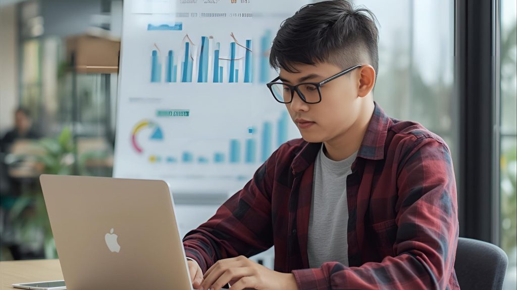 Student learning digital marketing using online tools like Google Analytics and SEMrush